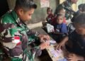 TNI Dorong Anak-Anak Papua Gemar Membaca dan Menulis di Tolikara