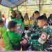 TNI Gelar Pelayanan Kesehatan Gratis di Tima Sebagai Wujud Nyata Membantu Menjaga Kesehatan Masyarakat di Wilayah Pedalaman Papua