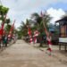 Satgas TMMD dan Warga Pasang Umbul-Umbul Sambut Kunjungan Tim Wasev di Kampung Keakwa